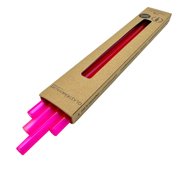 Im Set enthalten sind 4 neonpinke Glastrinkhalme (20 cm, gerade), und eine Reinigungsbürste aus Nylon. Verpackung offen.