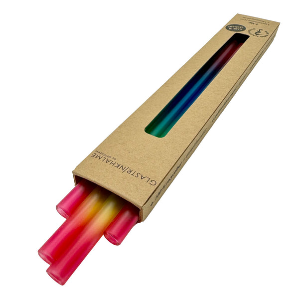 Im Set enthalten sind 4 farbenfrohe Regenbogenhalme (20 cm) und eine Reinigungsbürste aus Nylon. Offene Verpackung.